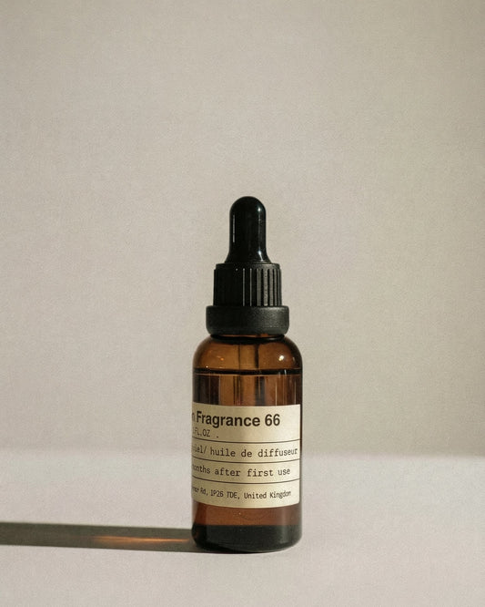 Amber glass bottle of Chavanc_Aroma No. 66 Provence Lavender Manuscript essential oil, vintage botanical style.