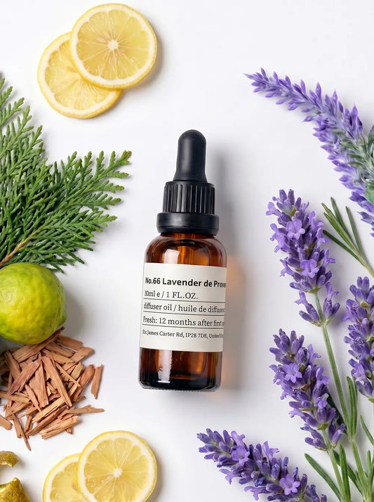 chavanc-aromo NO.66 Lavender de Provence essential oil bottle surrounded by vibrant purple lavender sprigs on a white background.