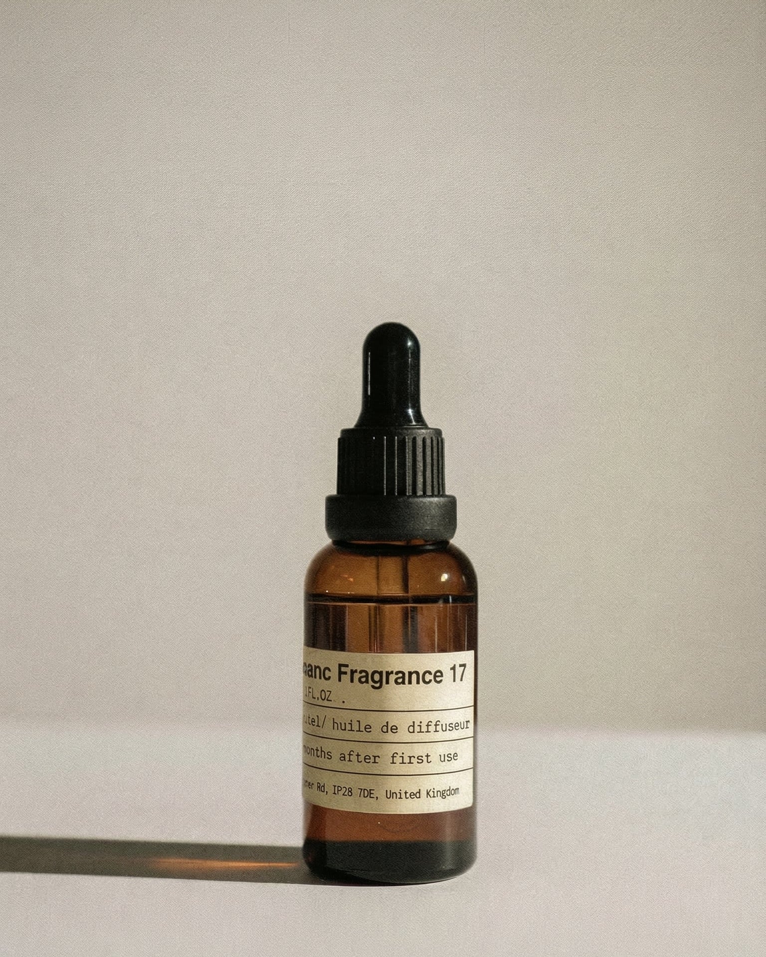 Chavanc Aroma No. 17 Winds of Darjeeling essential oil in the signature amber glass apothecary bottle.