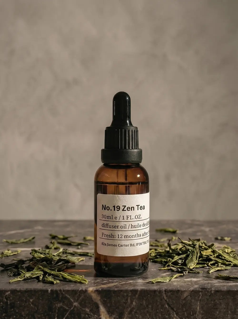 Chavanc_Aroma No. 19 All-Season Zen Tea essential oil in a signature amber glass apothecary bottle.