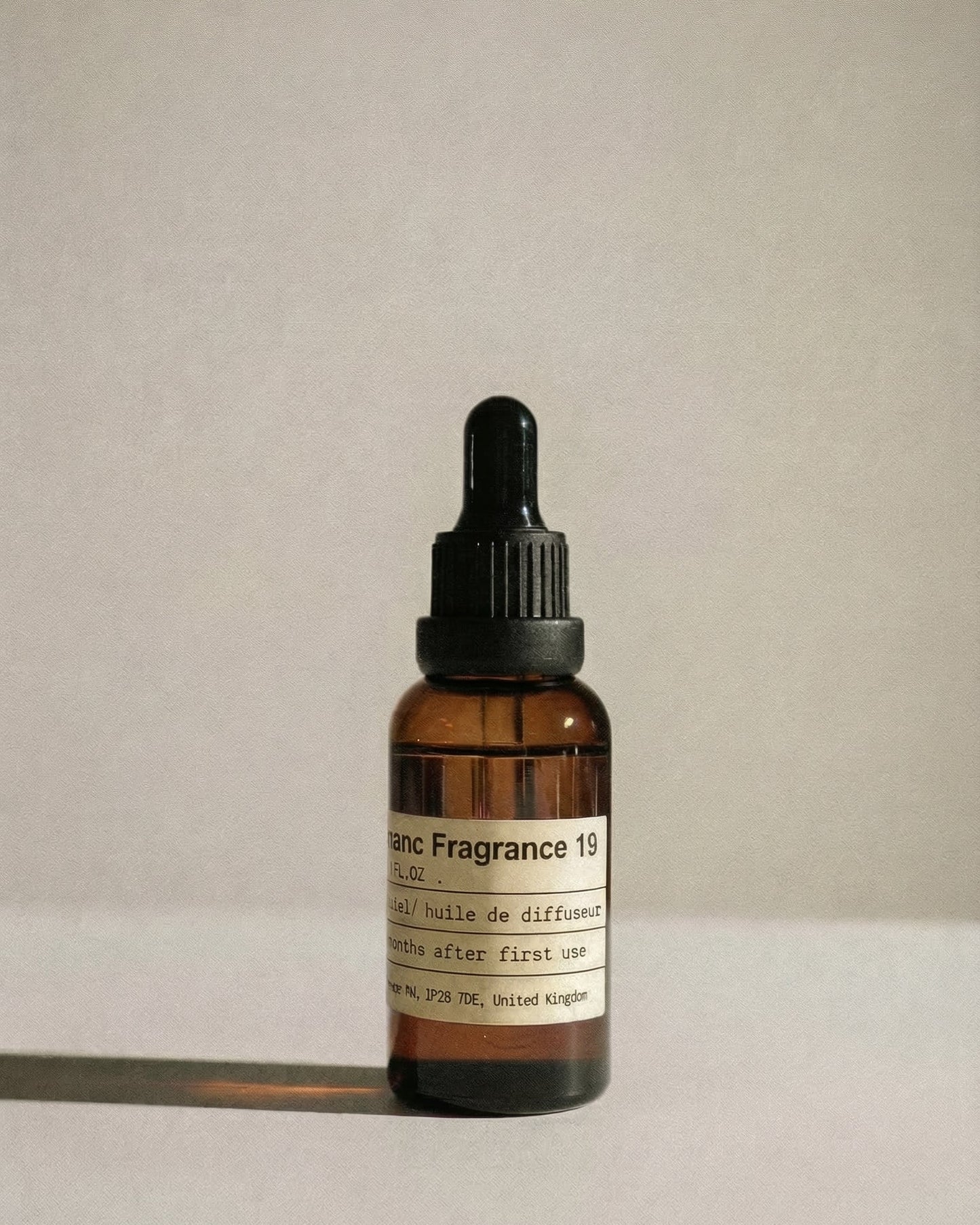 Chavanc_Aroma No. 19 All-Season Zen Tea essential oil in a signature amber glass apothecary bottle.