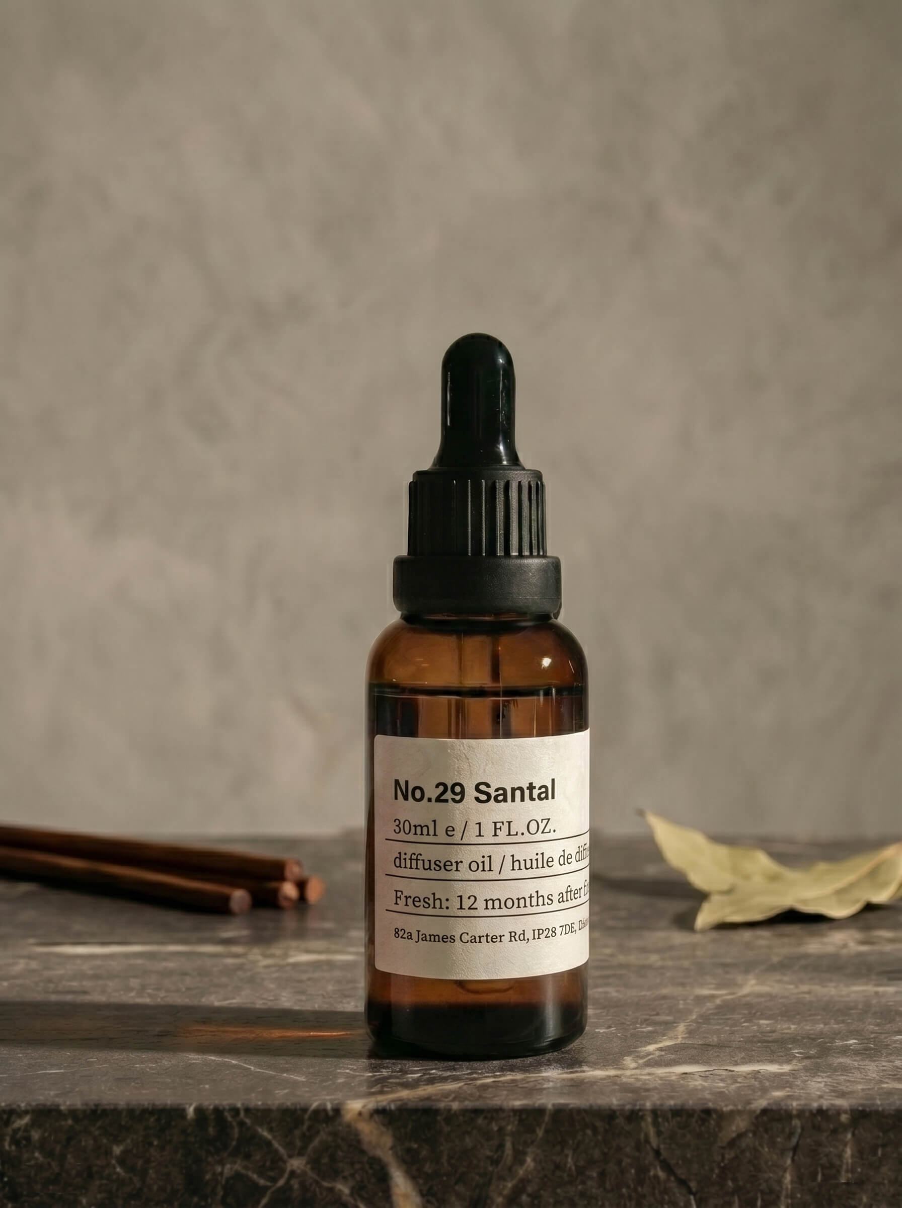 Vintage amber glass bottle of chavanc aroma 29 Santal Manuscript, featuring a minimalist apothecary label.